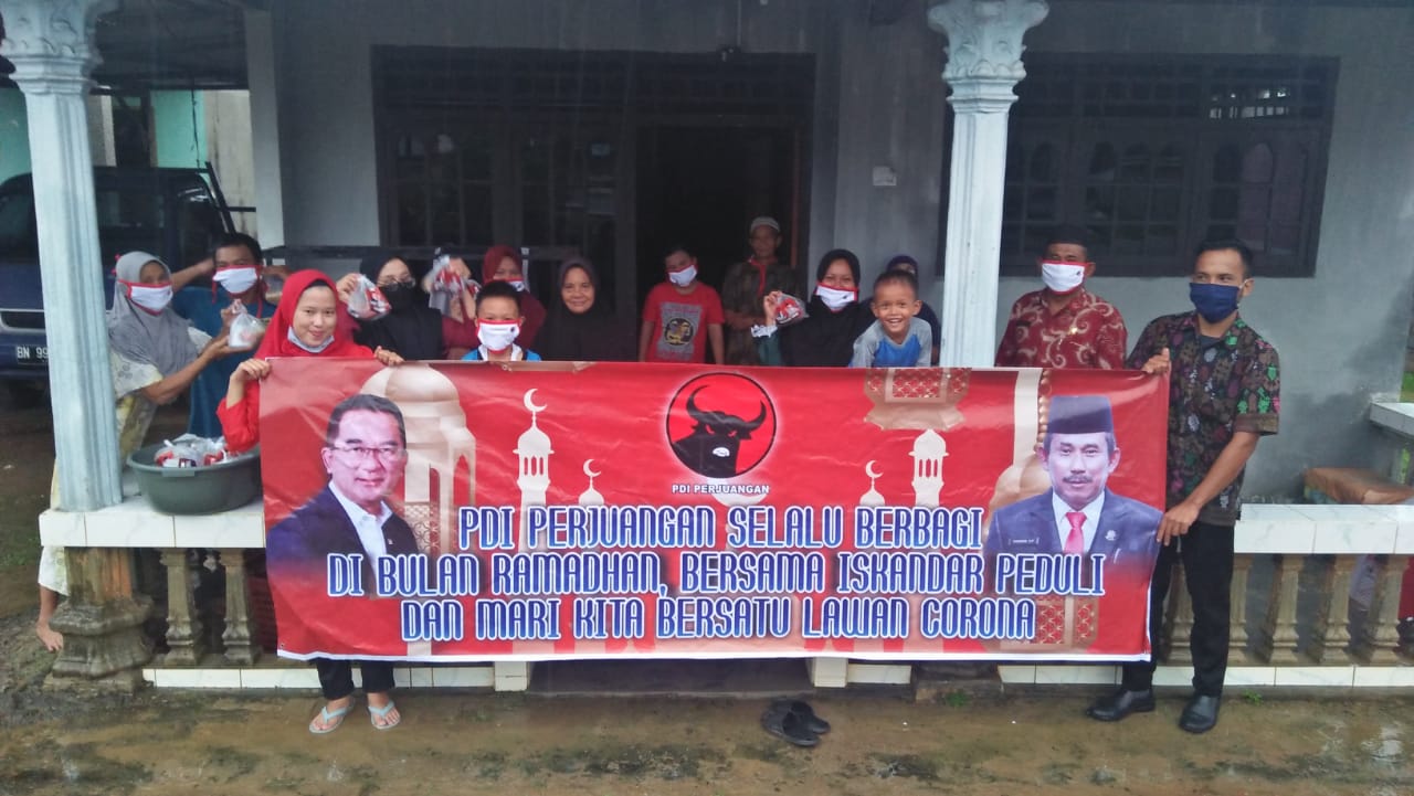 Tribe-Meski-Diguyur-Hujan-Iskandar-Peduli-Tetap-Berbagi-suthabangka-00.jpg